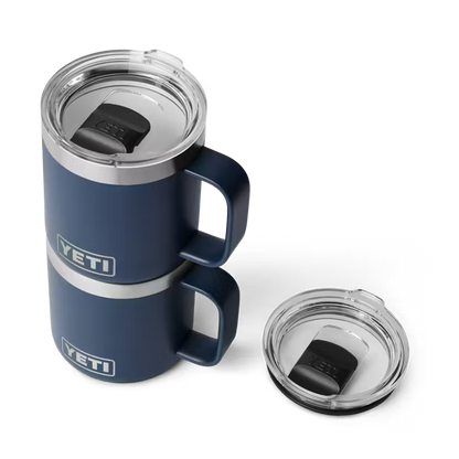 Blue YETI mug with clear lid on a white background