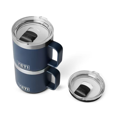 Blue YETI mug with clear lid on a white background